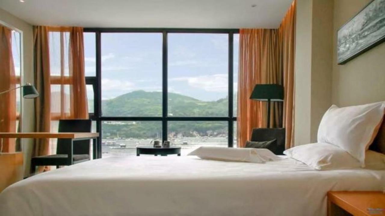Friend Hui Hotel زانغجياجي المظهر الخارجي الصورة